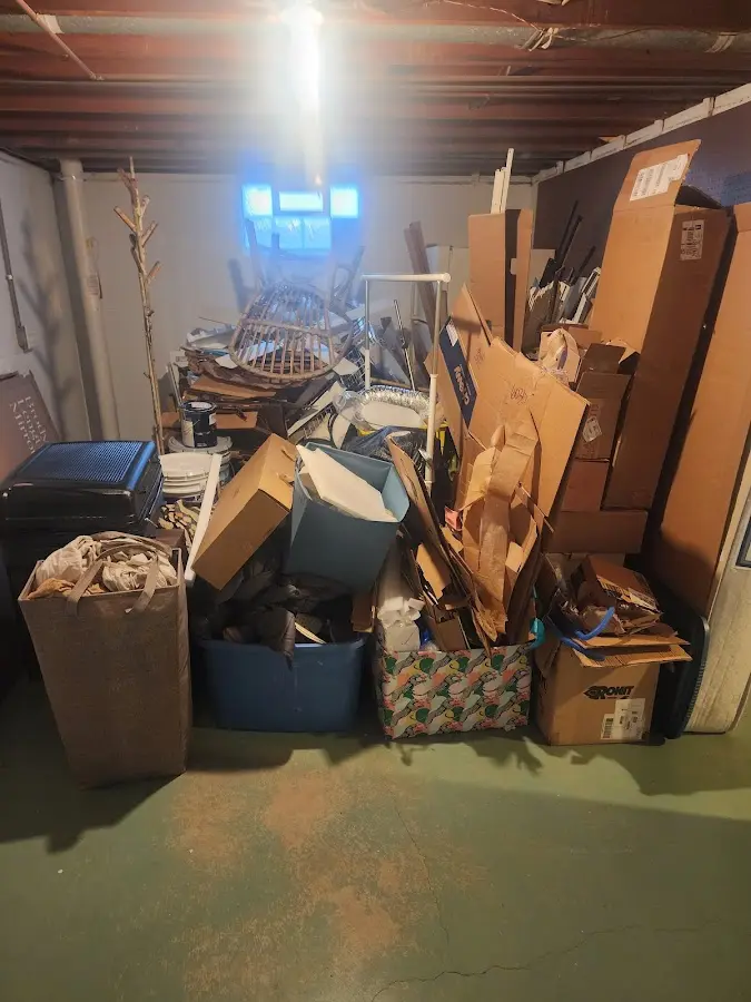 Roll-off dumpster container at job site for 2 Yard Dumpster Rental in Edinboro